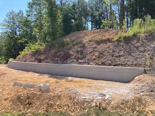 Concrete block retaining wall on hillside