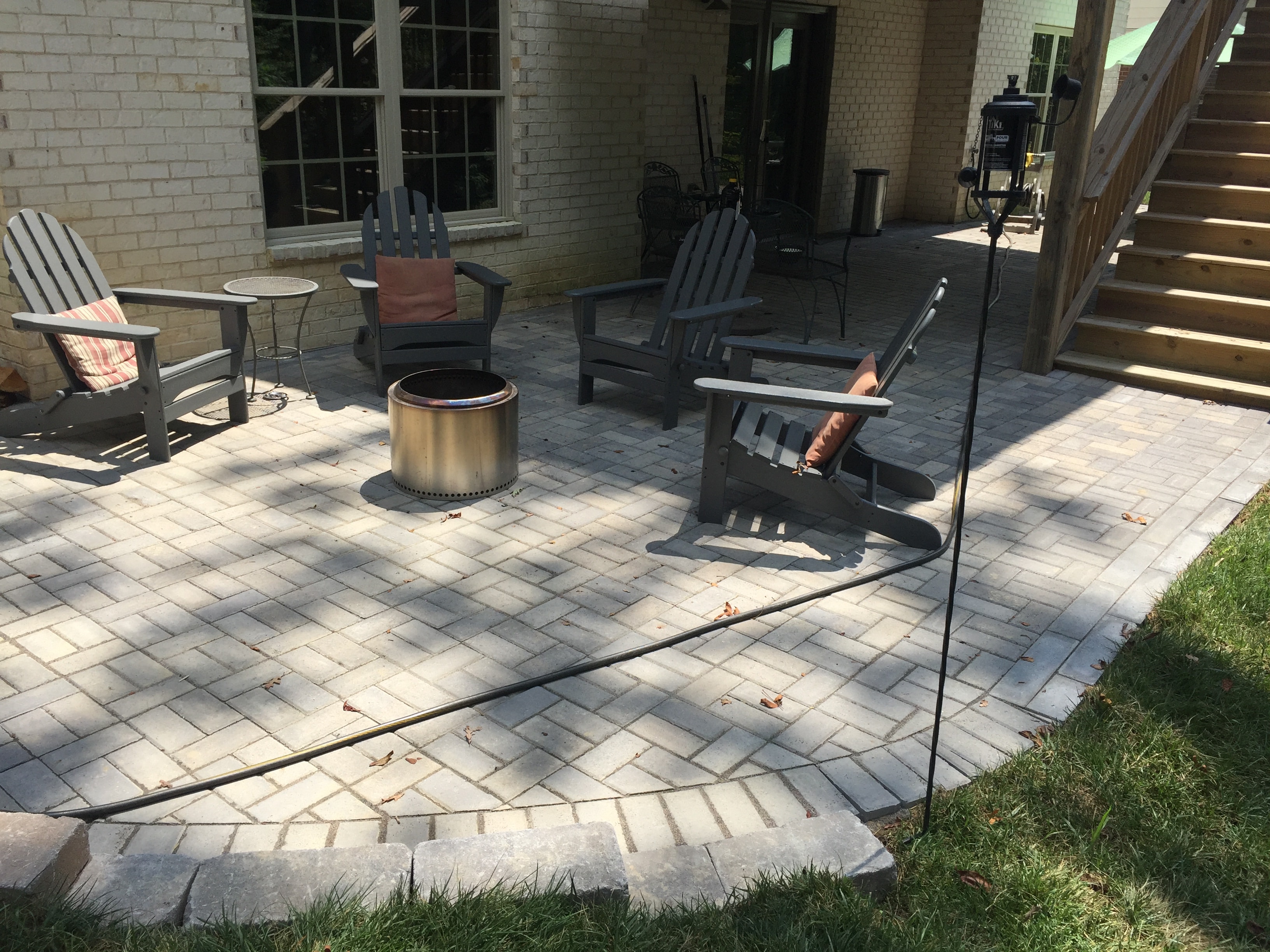 Paver patio with outdoor seating and fire pit