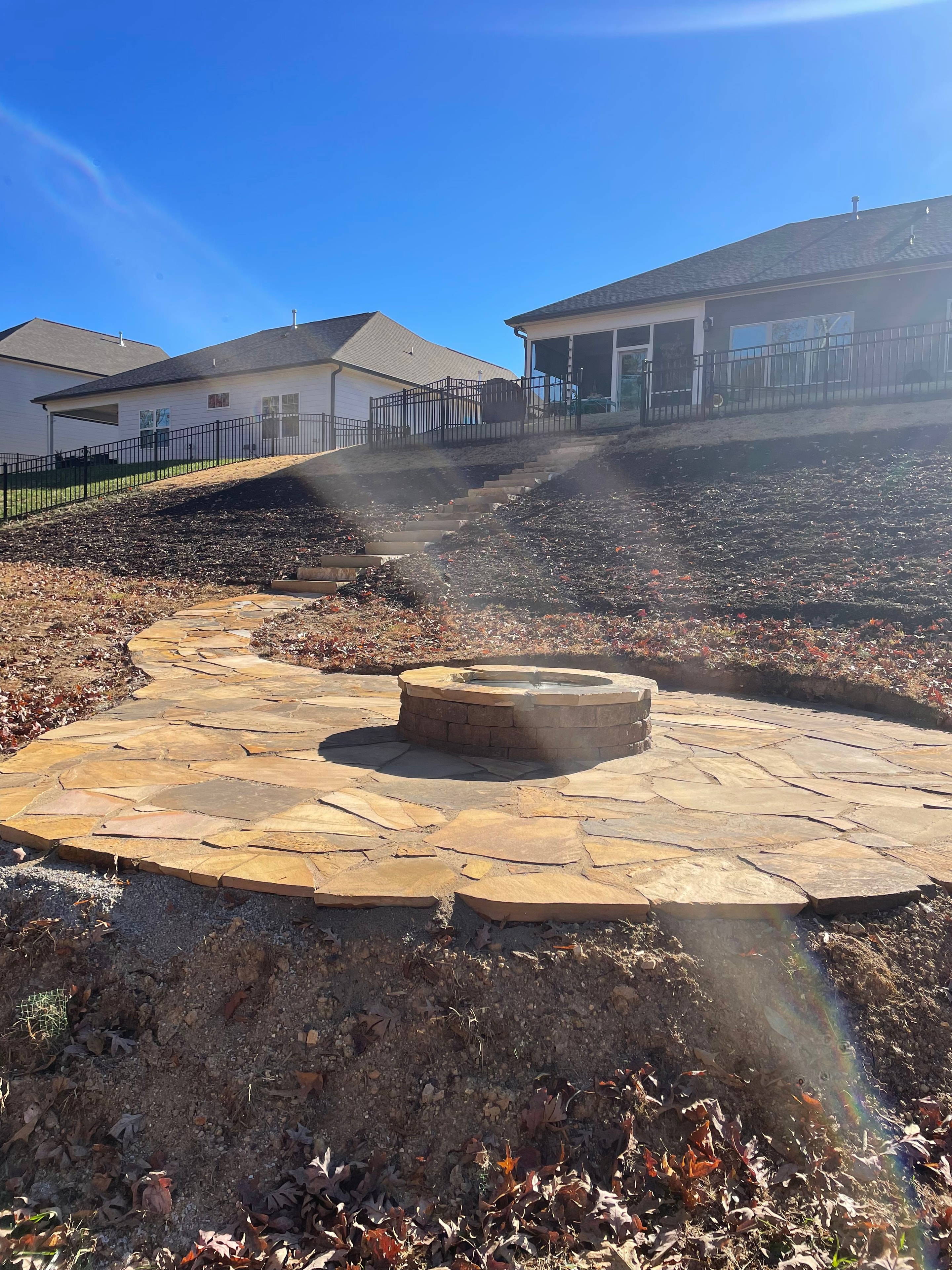 Flagstone patio with fire pit